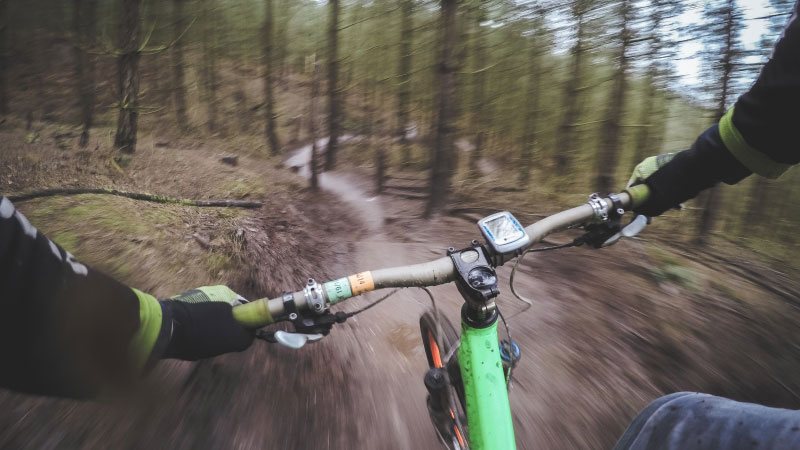A man biking while enjoying Guided Tours in Colorado