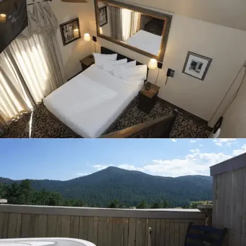 Evergreen Suite private jetted hot tub with forested hill views at Arrowhead Manor
