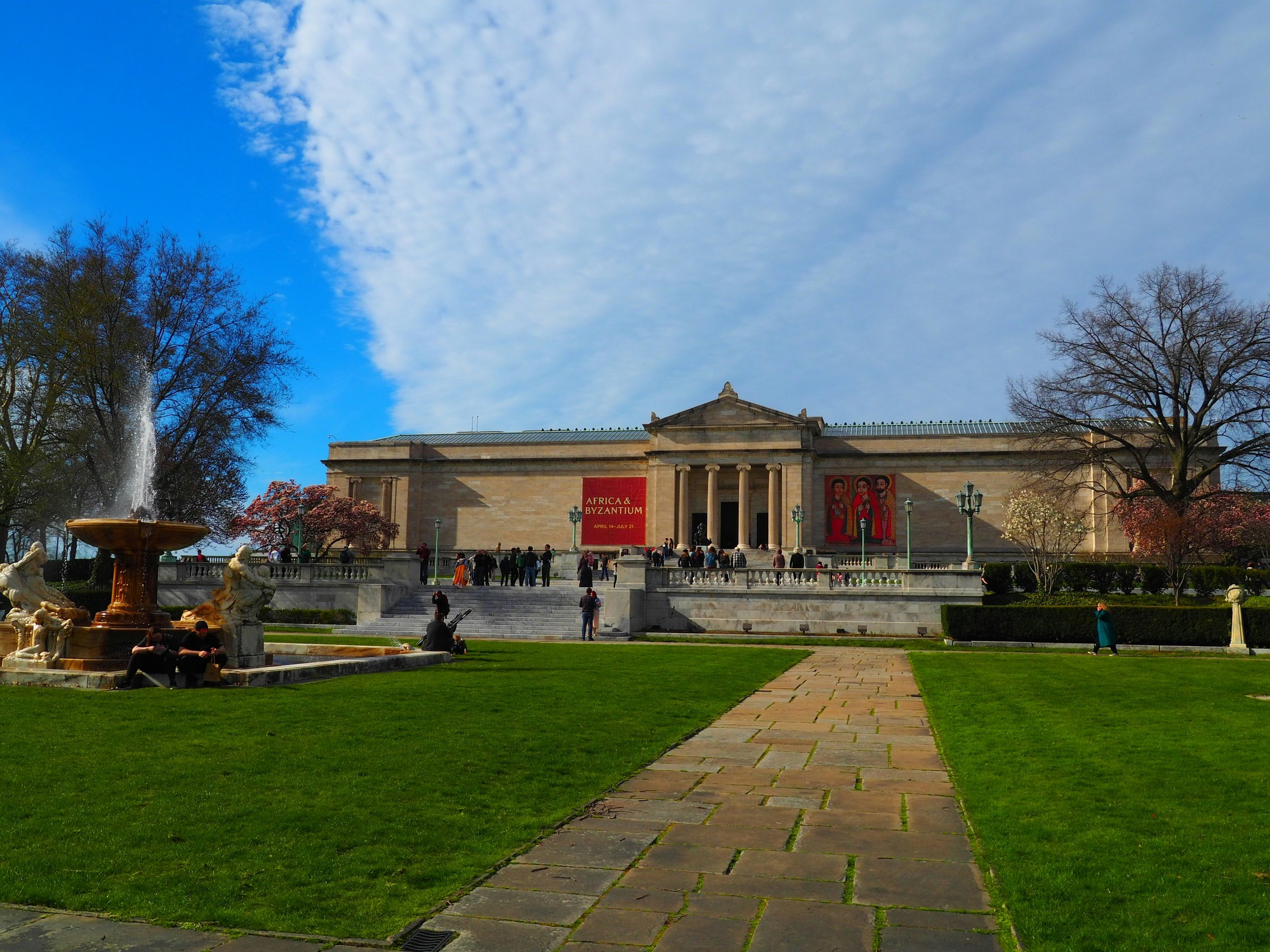 The Cleveland Museum of Art's neoclassical white marble facade reflected in the Wade Lagoon in University Circle, Cleveland