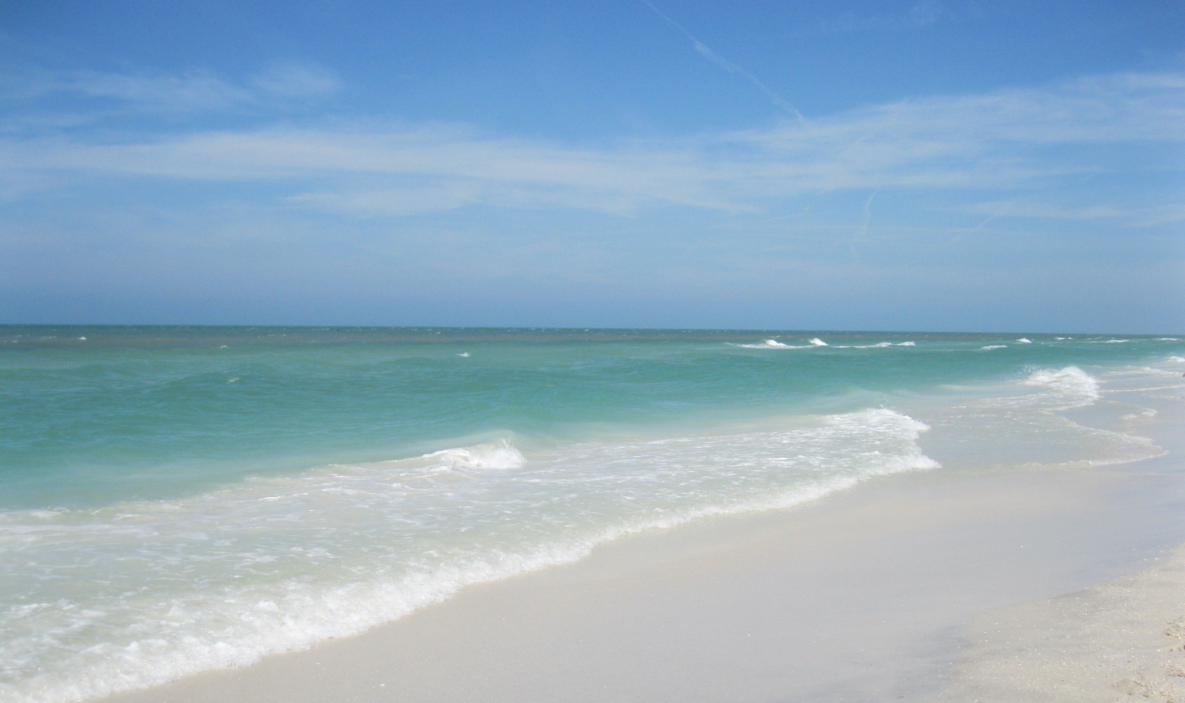 Clearwater Beach Florida white sand and turquoise water shoreline