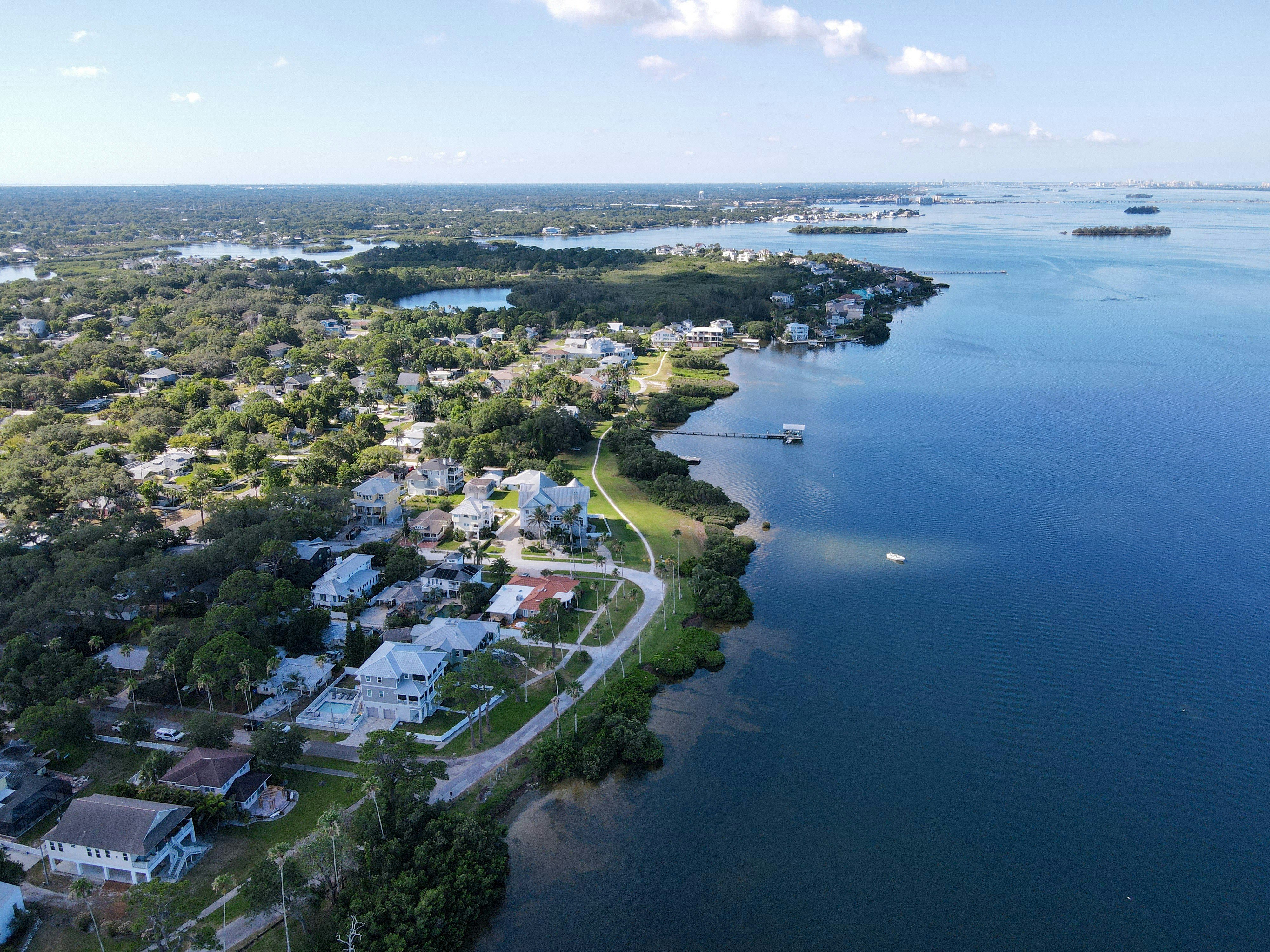 Crystal Beach aerial view of waterfront homes and Tampa Bay, Largo, Florida
