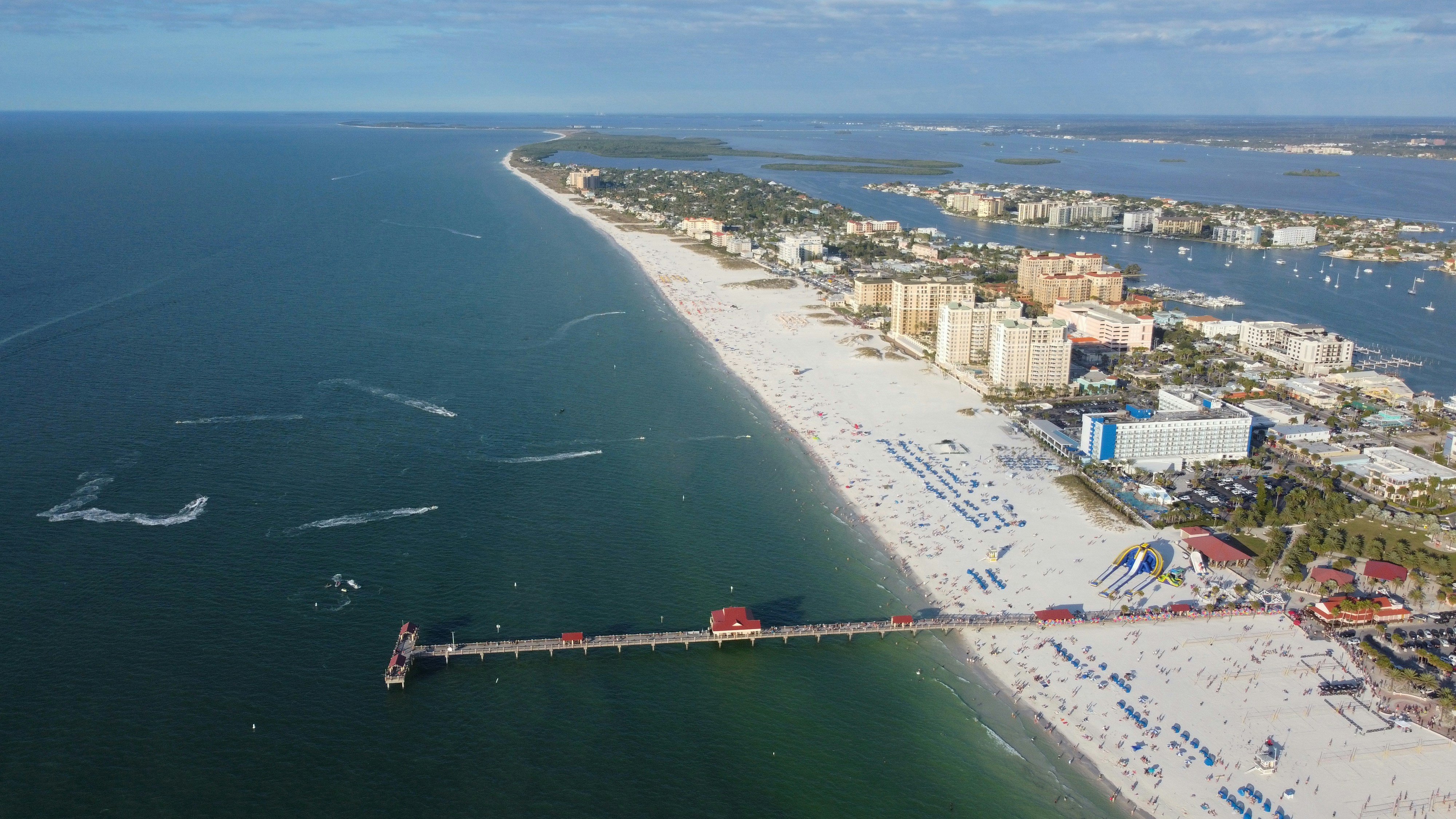 Aerial view of Clearwater Beach Florida with Pier 60 and turquoise Gulf water
