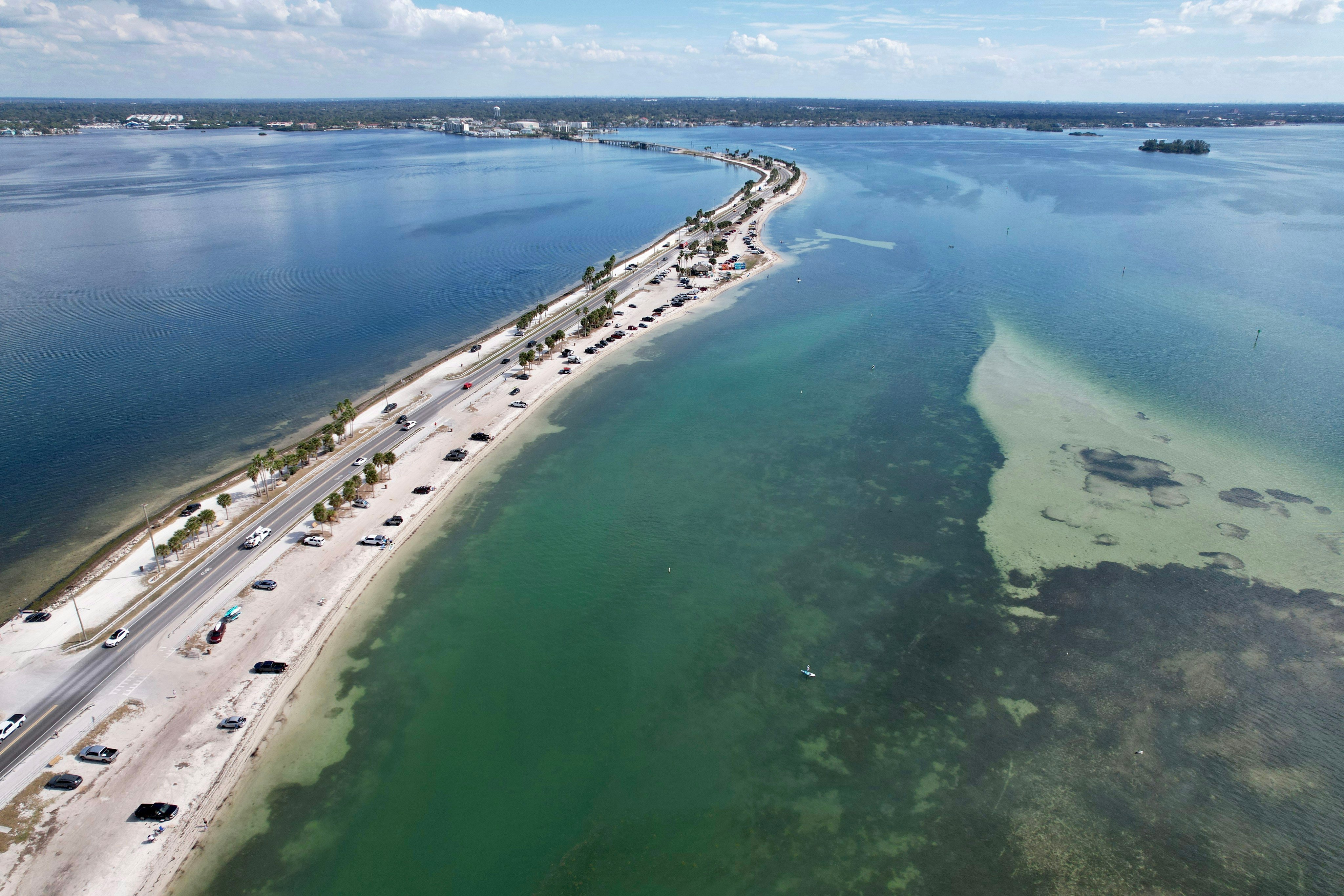 Aerial drone view of Dunedin Causeway white beaches and Tampa Bay near Largo, Florida