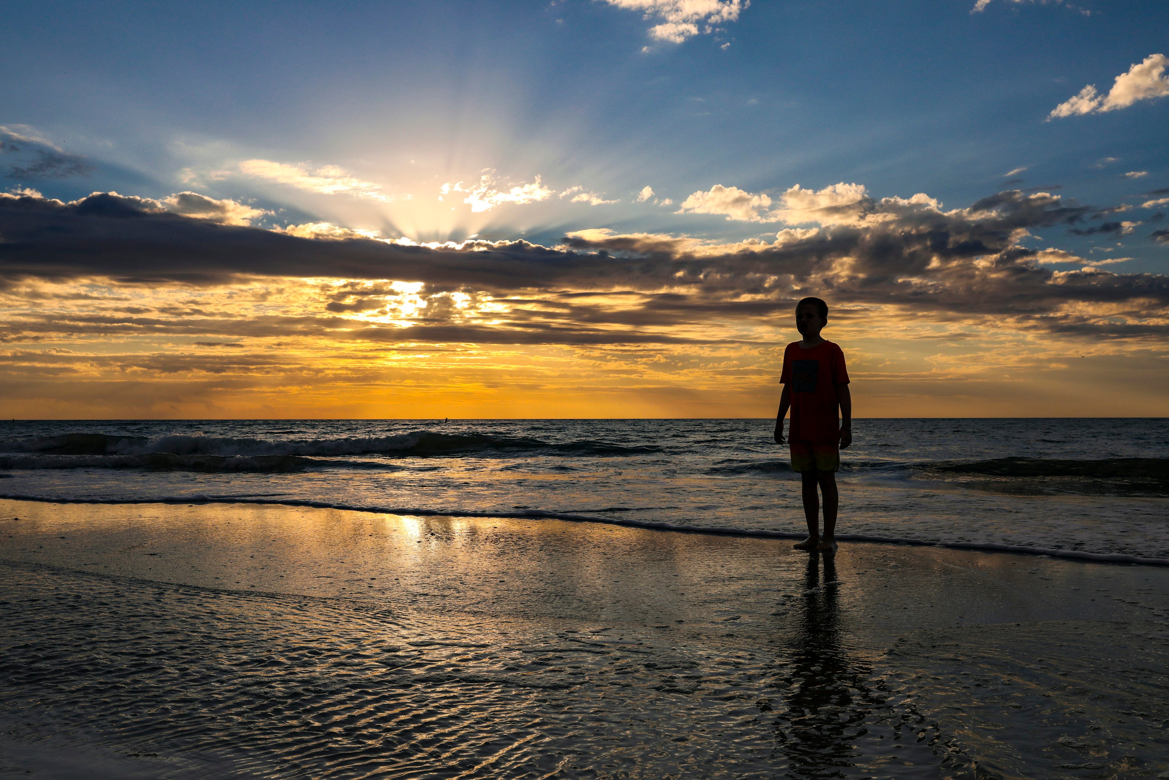 Bright golden sunset over Indian Rocks Beach, Florida