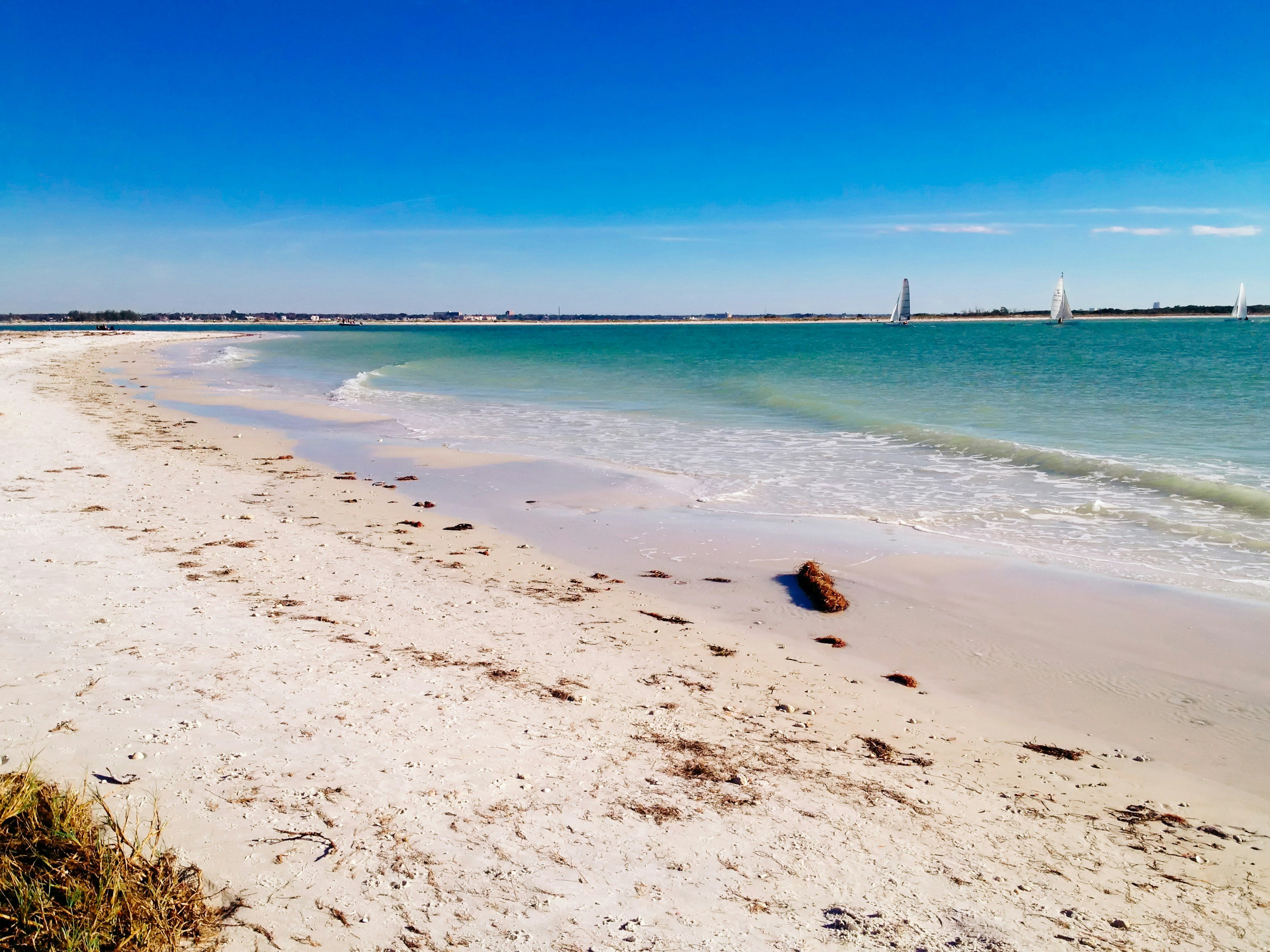 White sand beach with calm turquoise water near Anna Maria Island, Florida