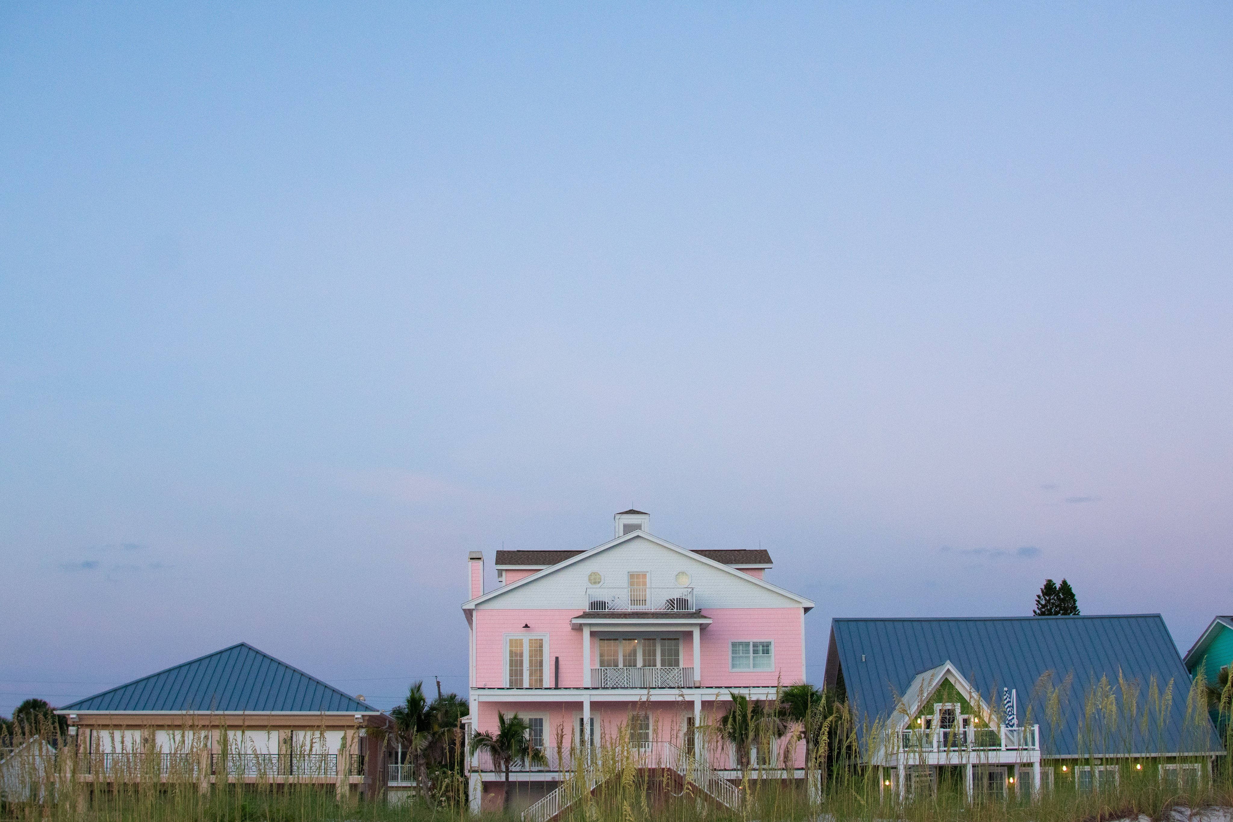 Colorful beachfront homes on Clearwater Beach, Florida at dusk