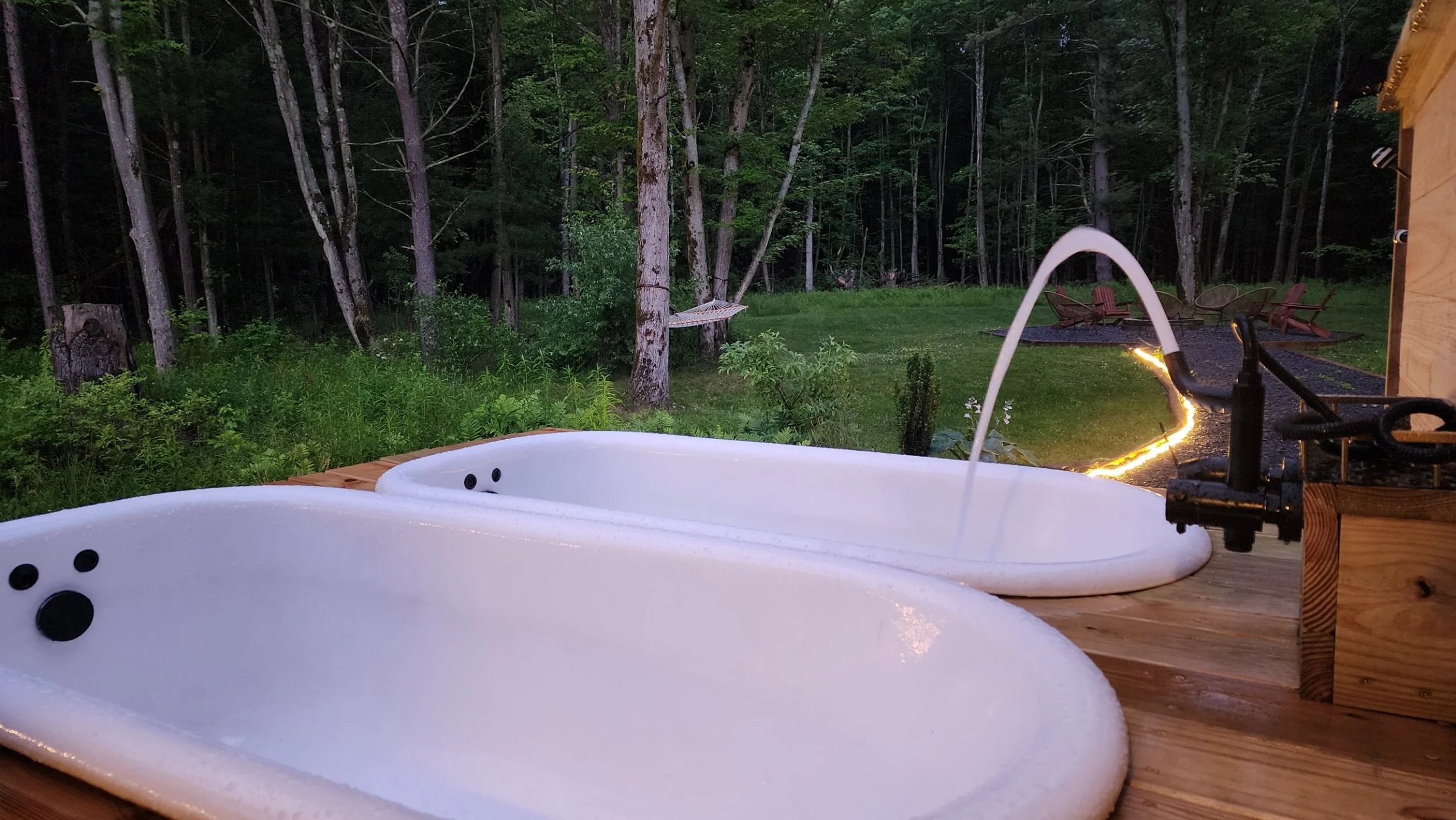 The Hideaway Filling Outdoor Tubs.jpg