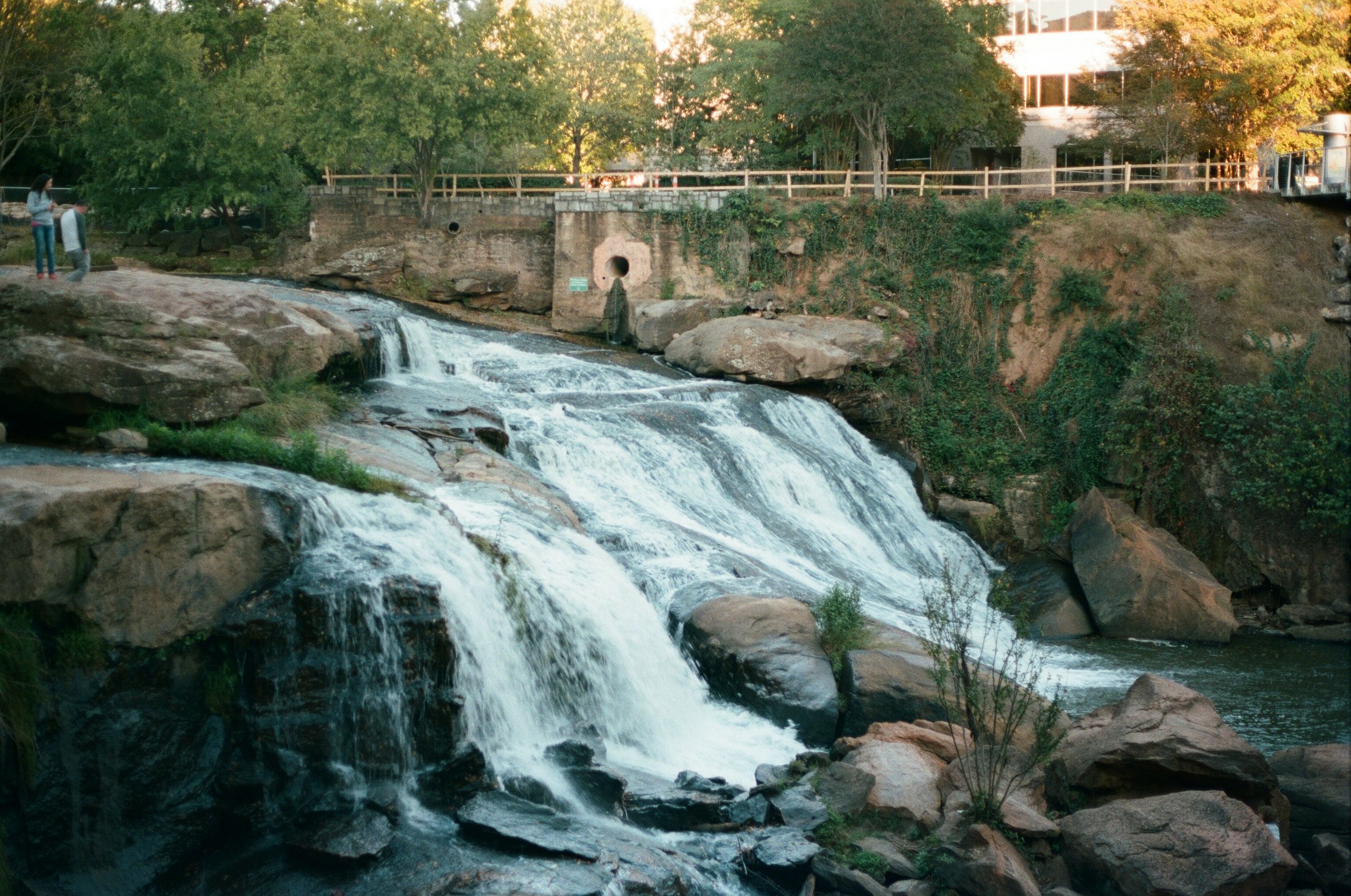 The Liberty Bridge over the Reedy River waterfall at Falls Park on the Reedy in downtown Greenville, South Carolina, on a cold winter afternoon