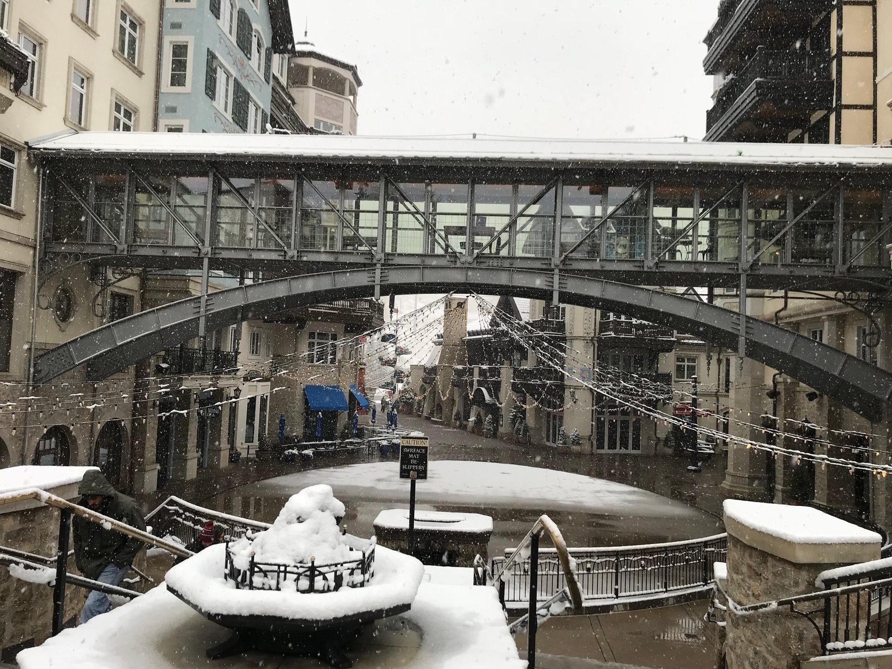 Big snowflakes falling down in Lionshead Village