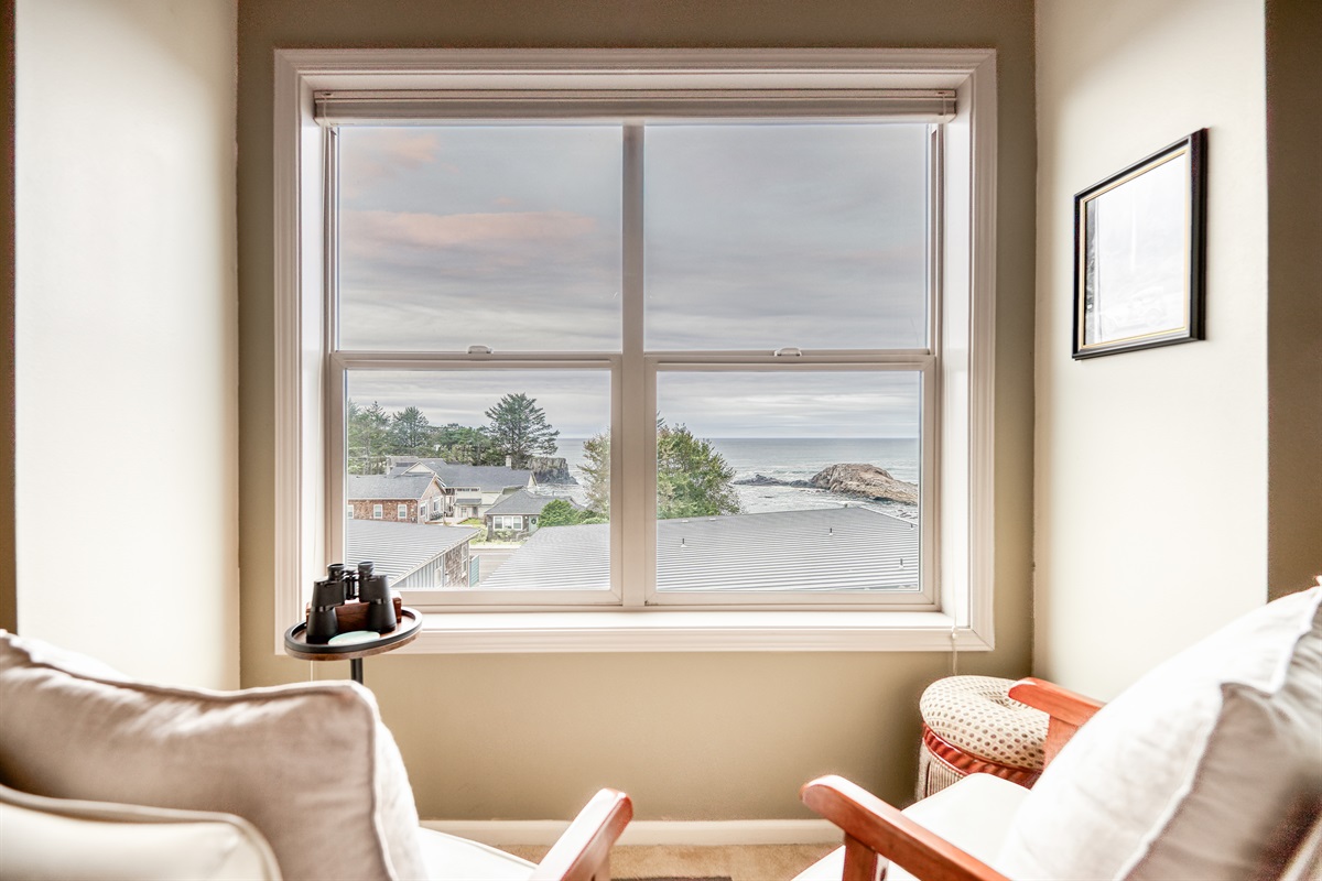 Cozy Cove Peace reading nook with ocean view over Pirate Cove in Depoe Bay