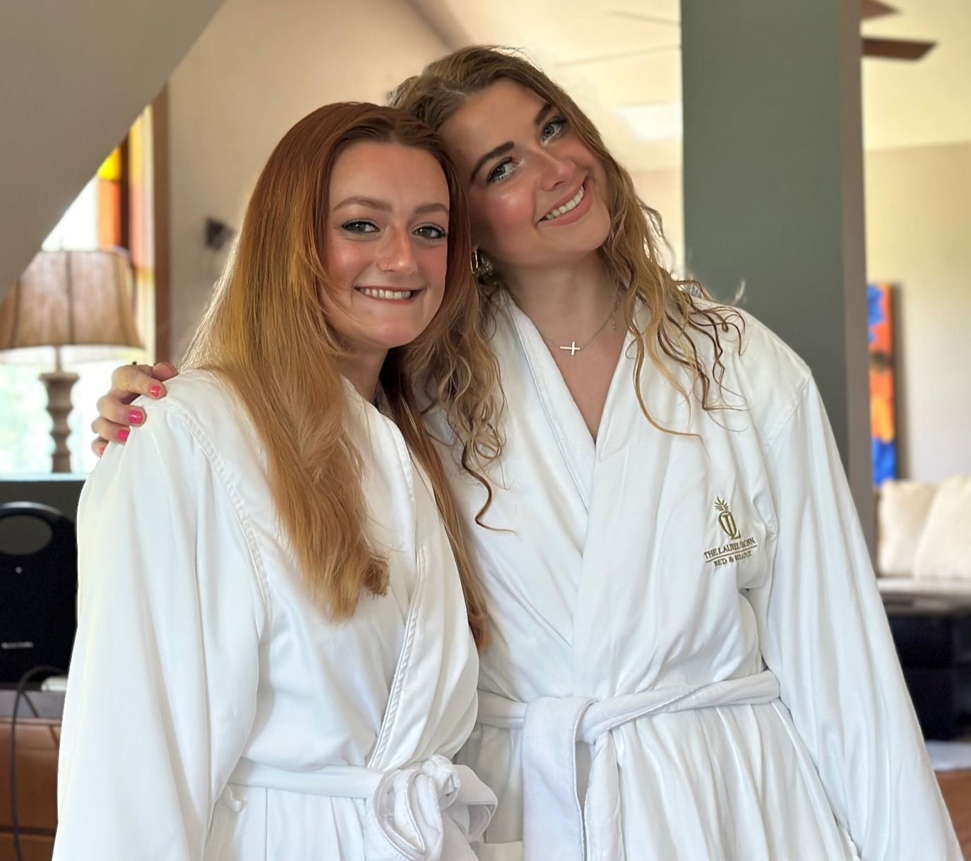 women hugging after a day of pampering at the laurel oak inn