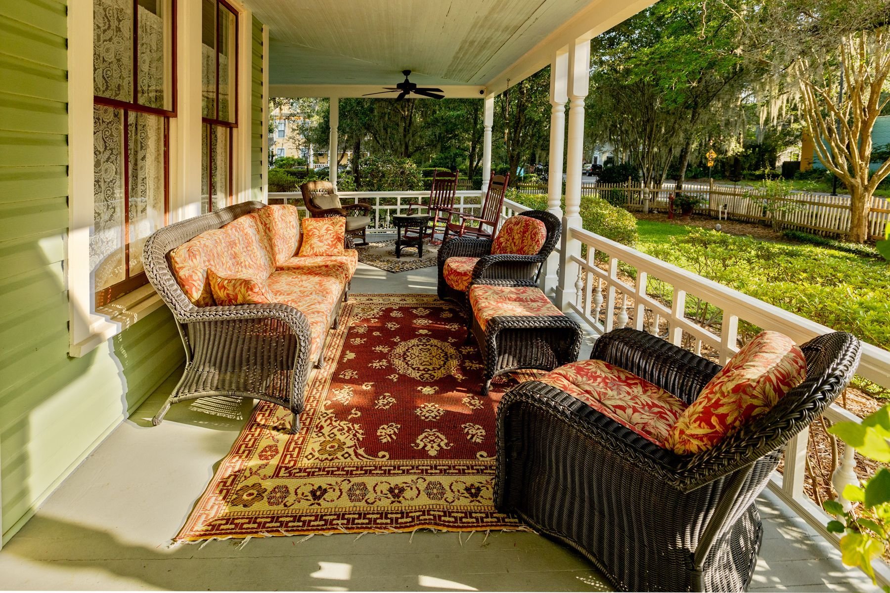 Gainesville gem. Camellia Rose Mansion front porch and landscaping