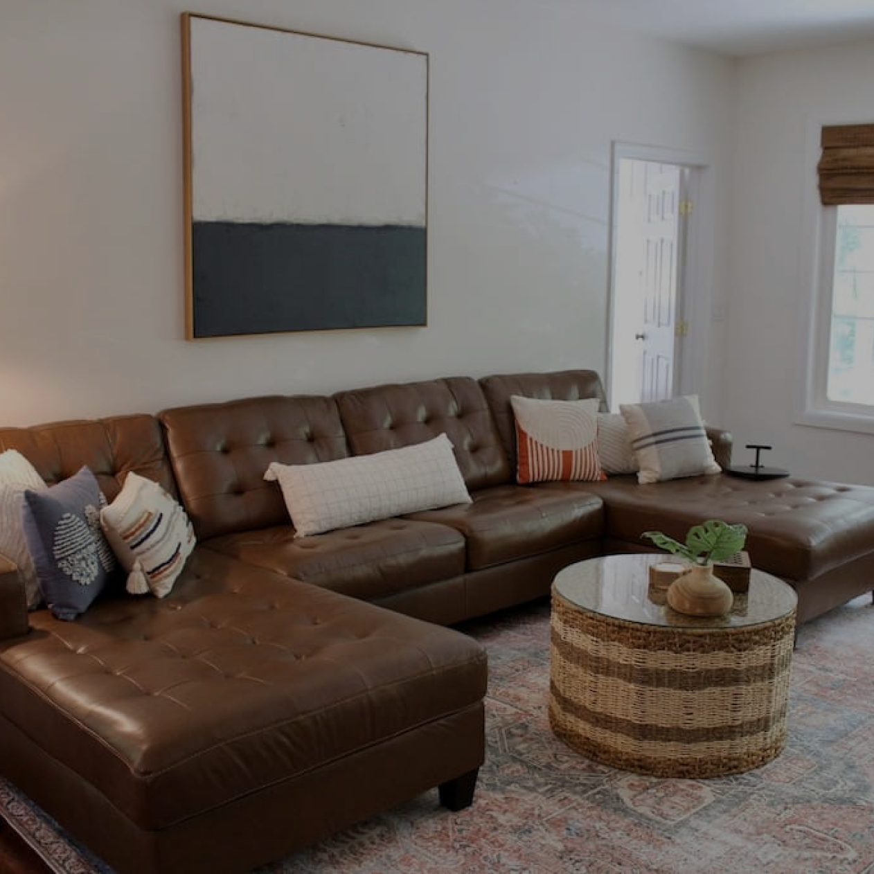 living couch view of a short term rental