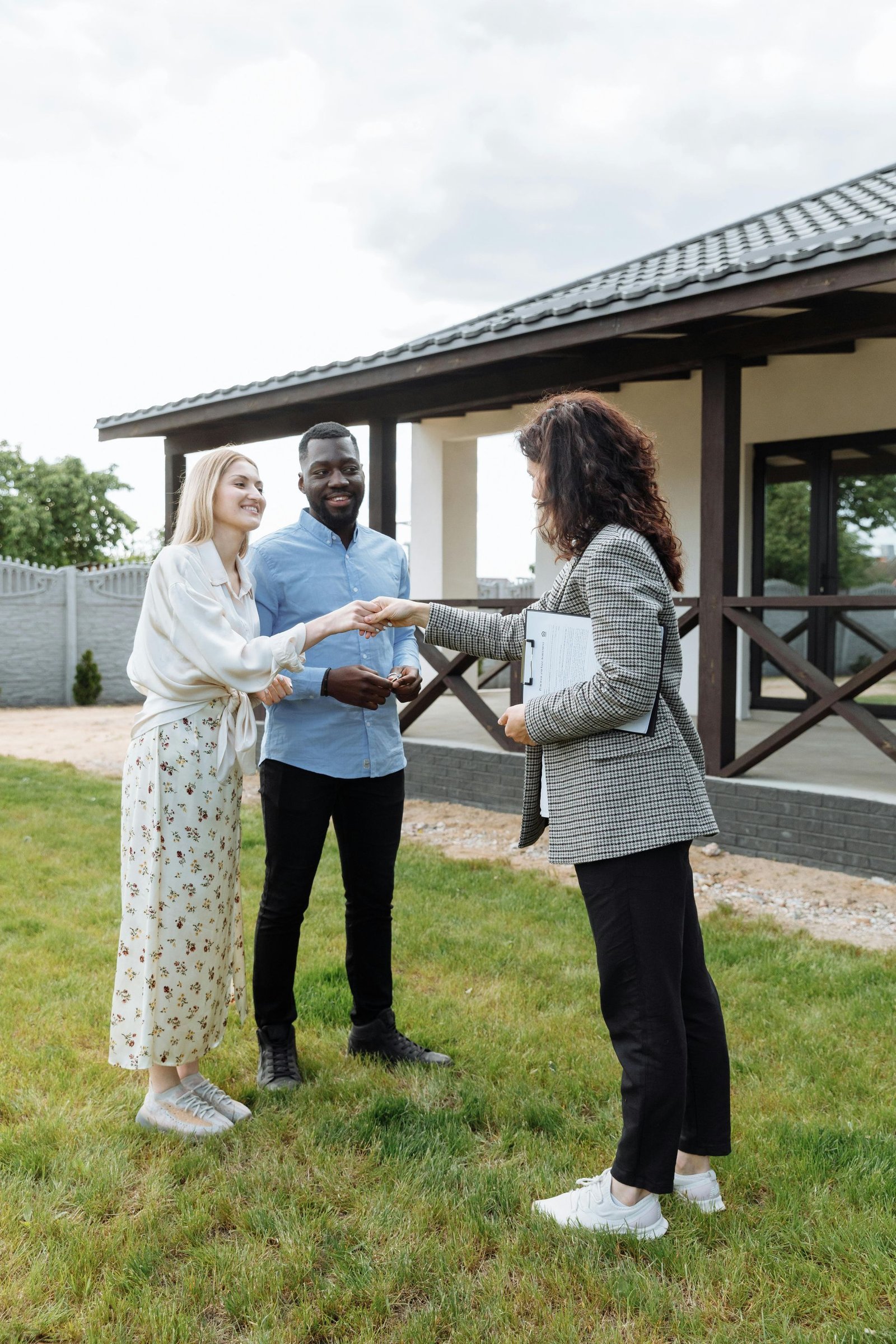 A couple closing a deal for an AirBNB