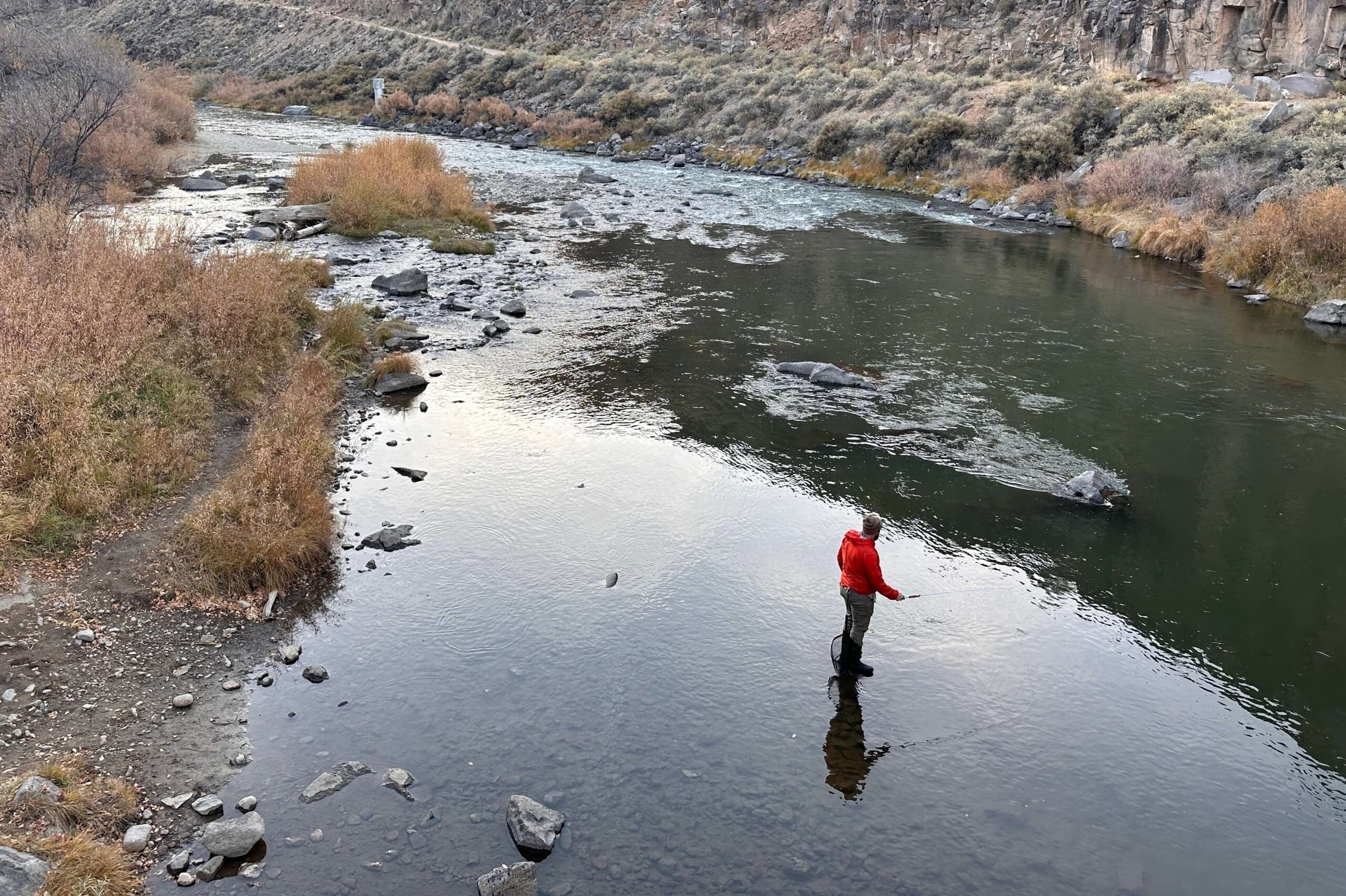 A man enjoying Fly Fishing New Mexico.