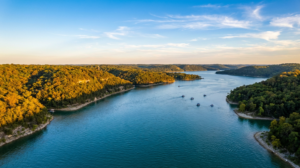 Aerial view of Table Rock Lake's crystal-clear waters and wooded shoreline near Branson, Missouri