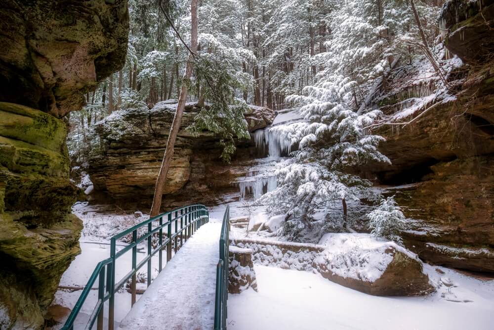 View of Cedar Falls during the winter; one of the best hikes in Hocking Hills