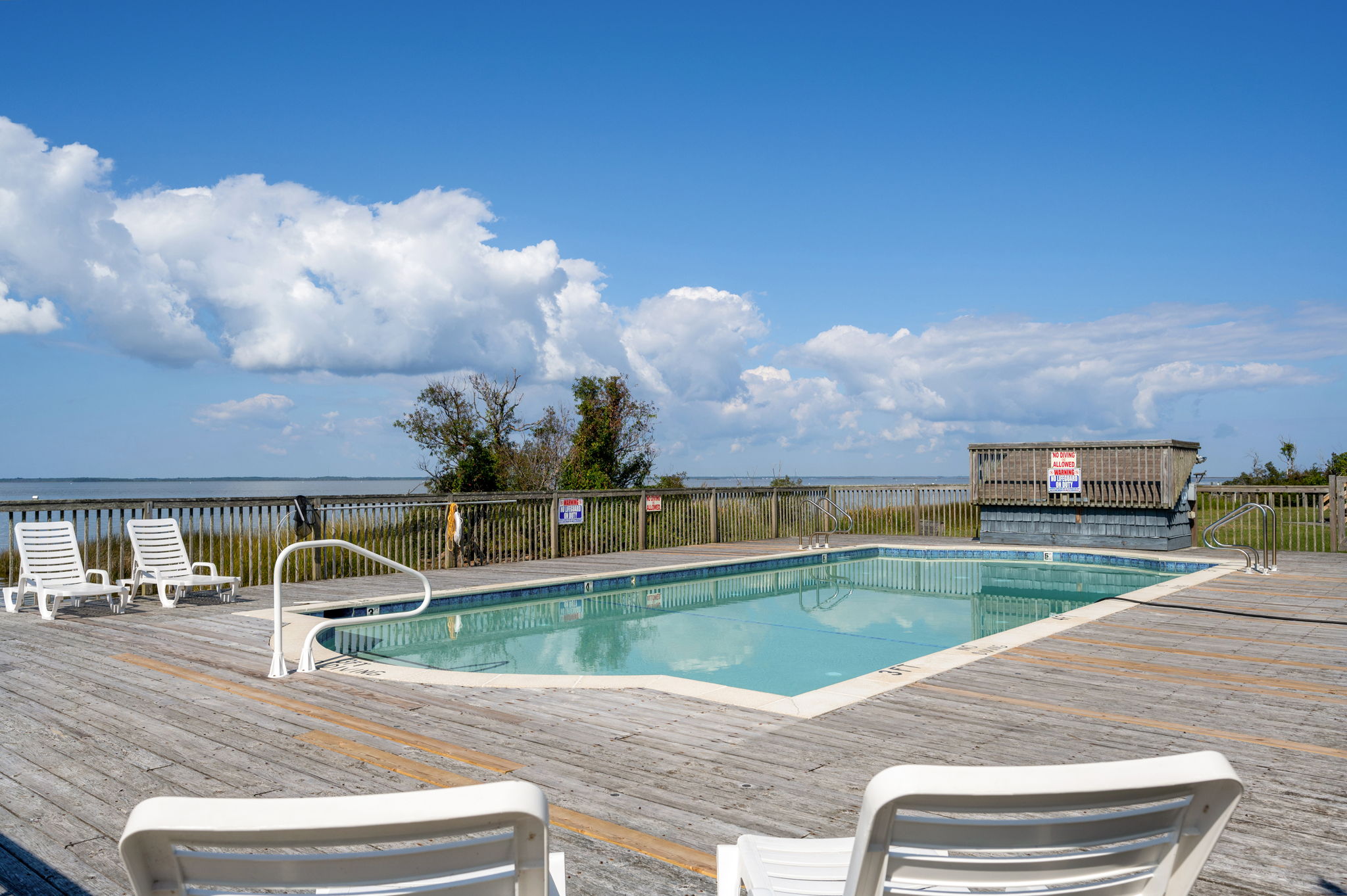 Private outdoor pool at a LuxStay USA Outer Banks estate