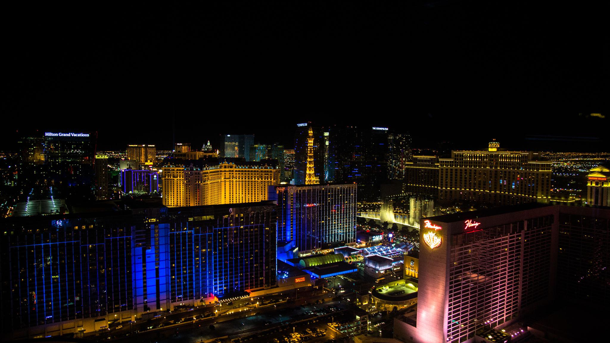 Private balcony suite at MGM Signature Las Vegas overlooking the Strip skyline at sunset