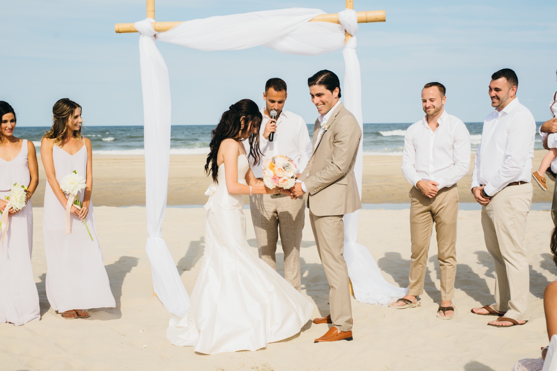 Oceanfront wedding setup at a LuxStay USA estate, Outer Banks