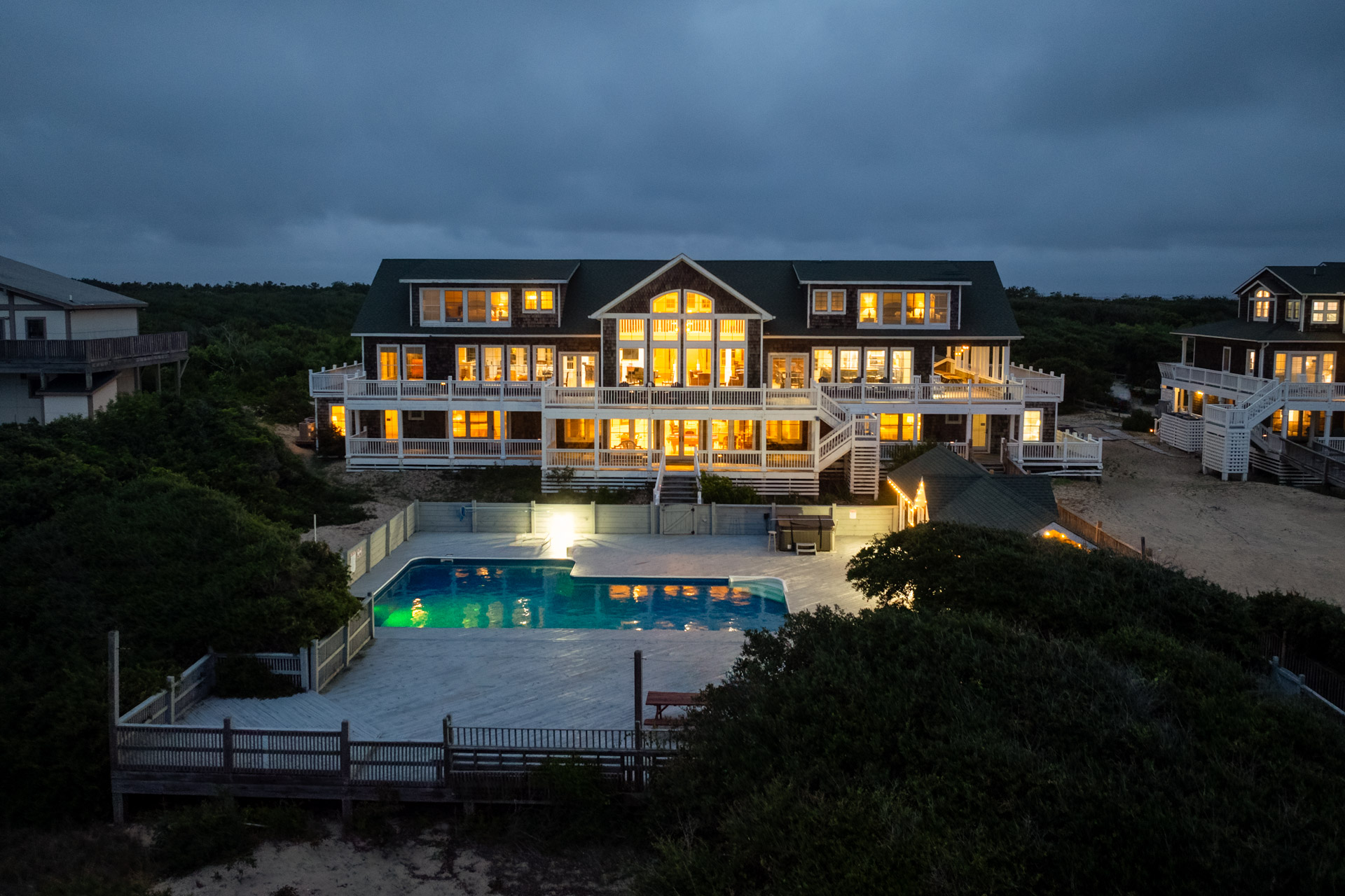 Large luxury beachfront estate at dusk, Outer Banks