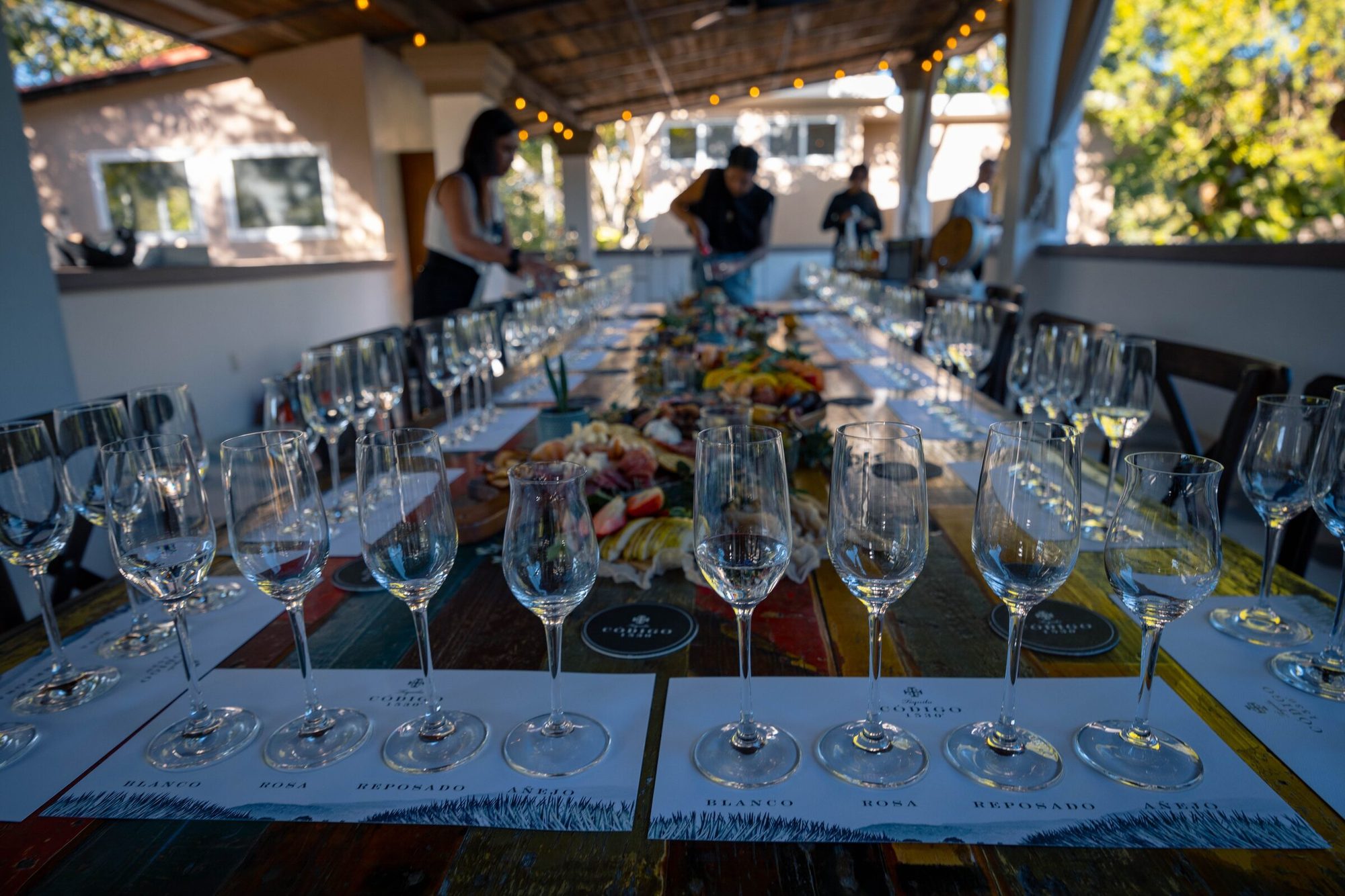 Código 1530 tequila tasting setup at Rancho Poco a Poco concert