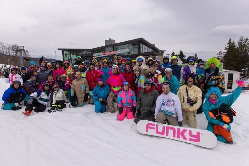 100+ skiers in 80s costumes for annual group photo at K-1 Base Lodge Killington Vermont