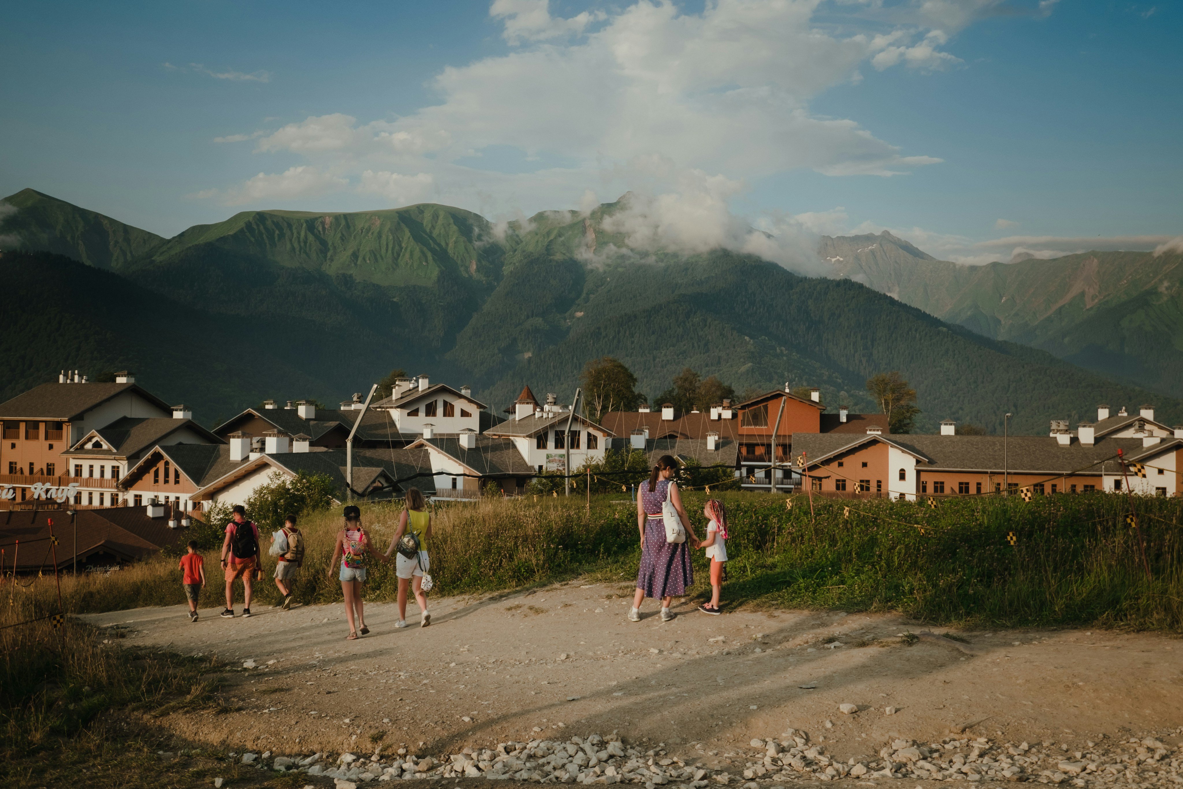 Mountain town with visitors enjoying the summer sunshine