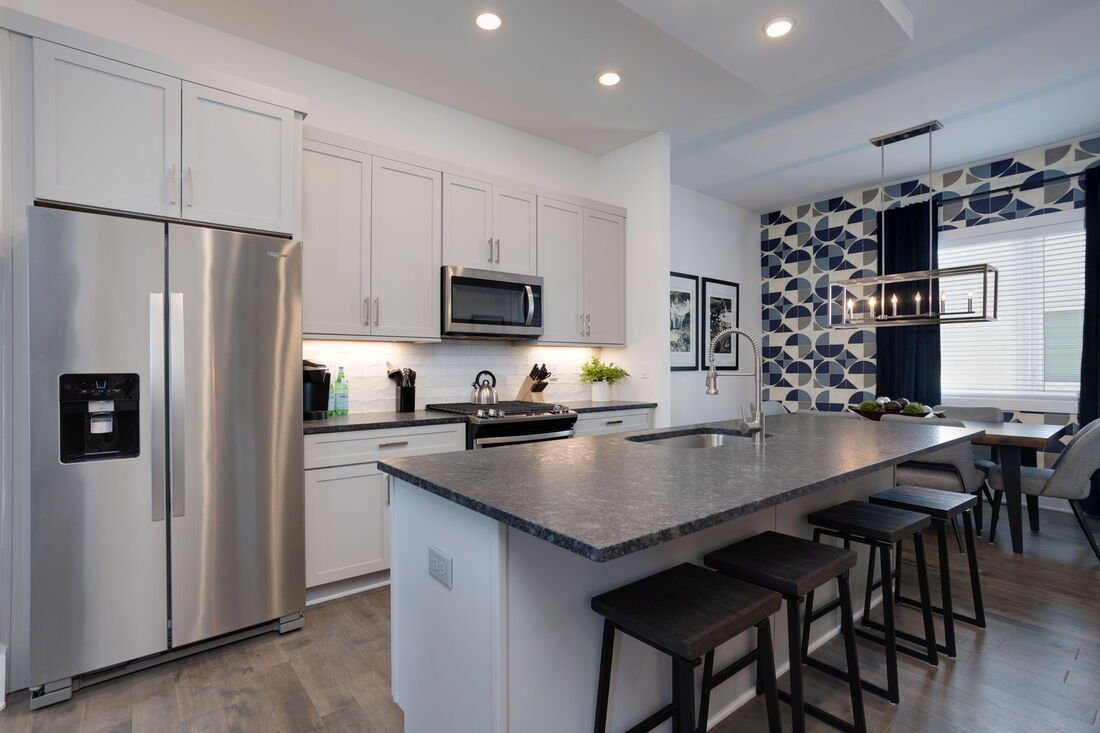 The Vibe kitchen with modern appliances and open layout