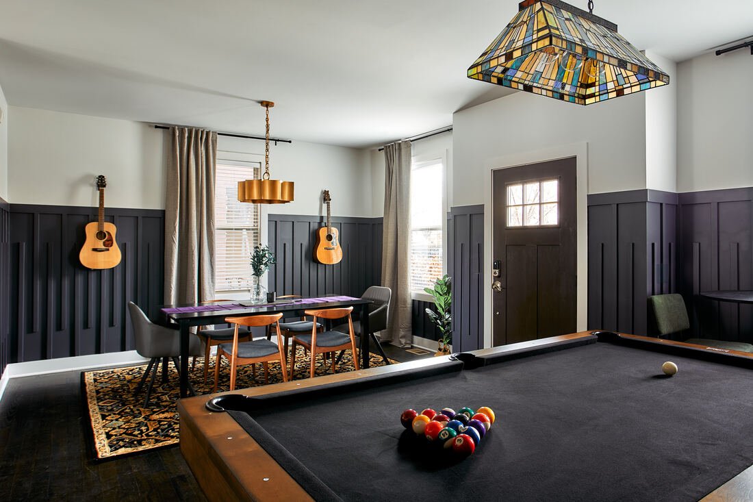 Game room with dining area and feature lighting