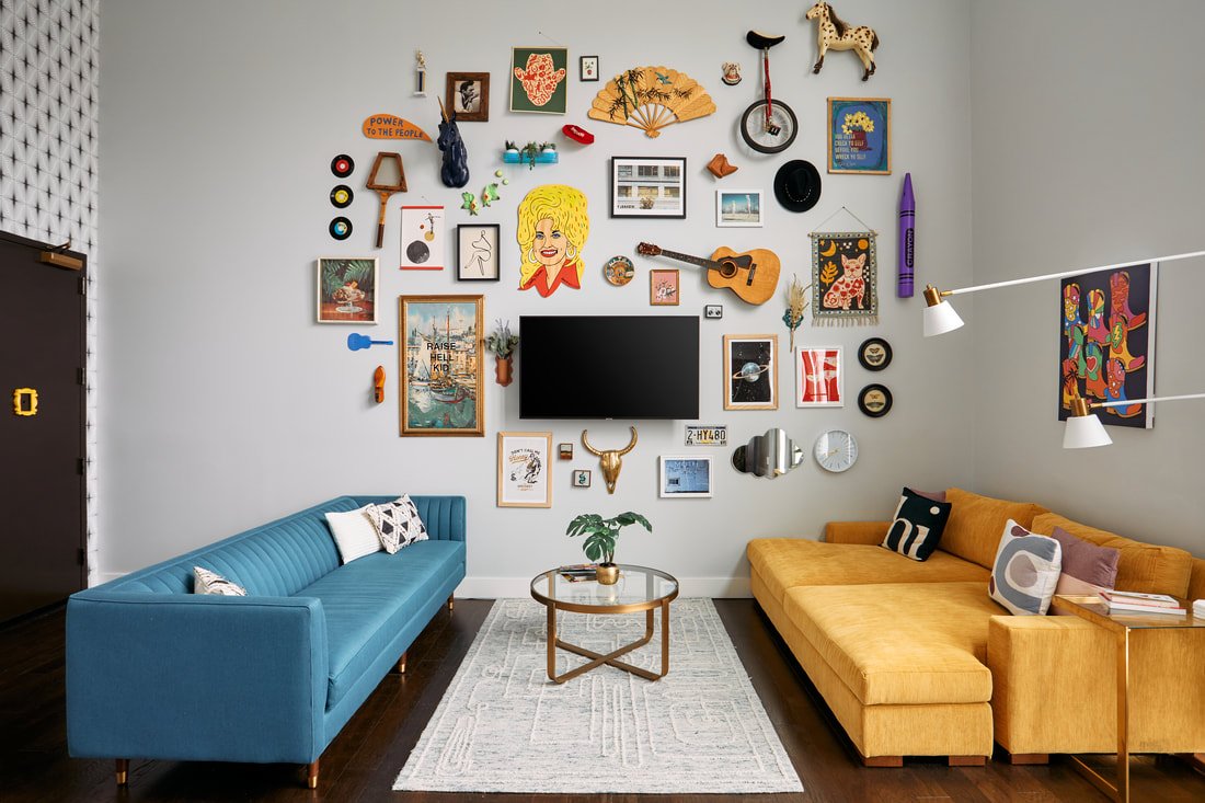 Jungle-themed living room with layered textures, bold colors, and bamboo accents