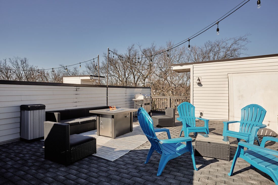 The Johnny rooftop patio with Nashville skyline