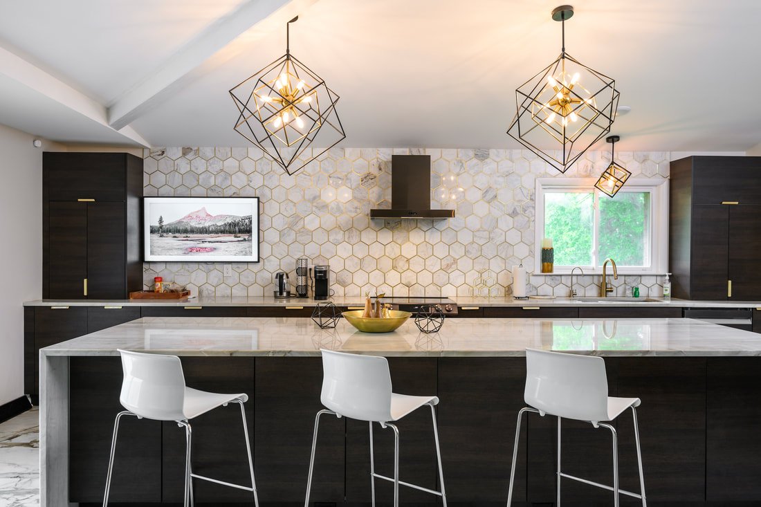 Gourmet kitchen with marble island at Nashville midcentury modern home