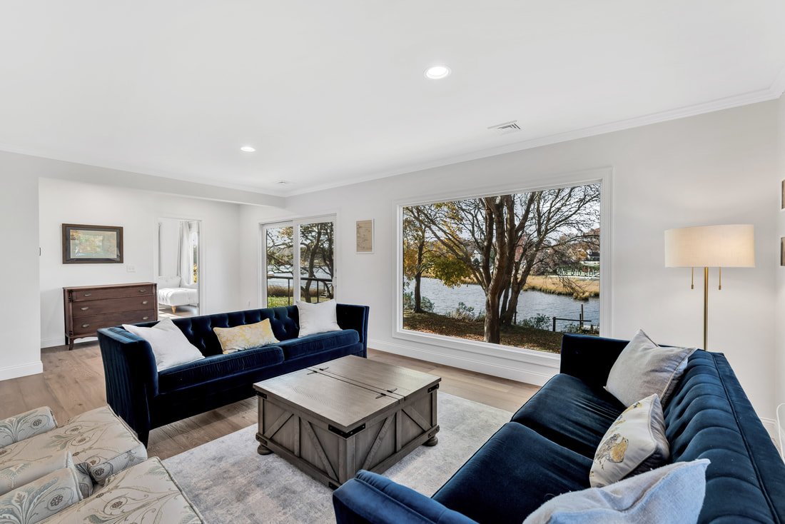 The Madeline family room with water views