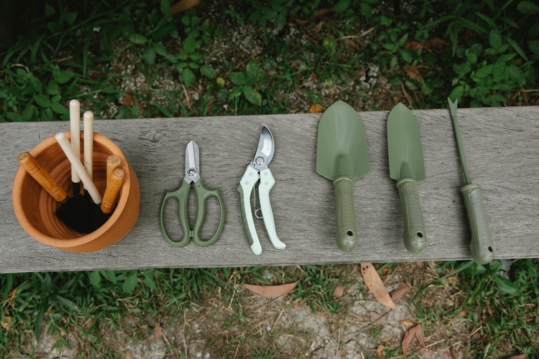 Gardening gloves and tools ready for spring outdoor chores