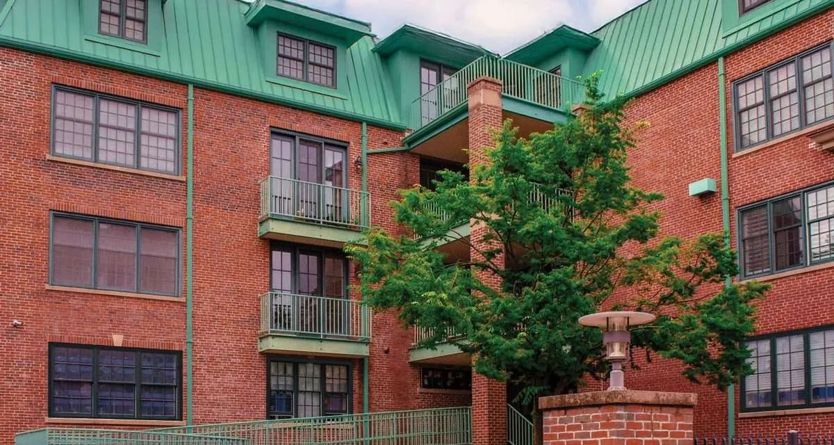 Why Condo Management Companies Should Prioritize Roof Replacement Every 20–25 Years