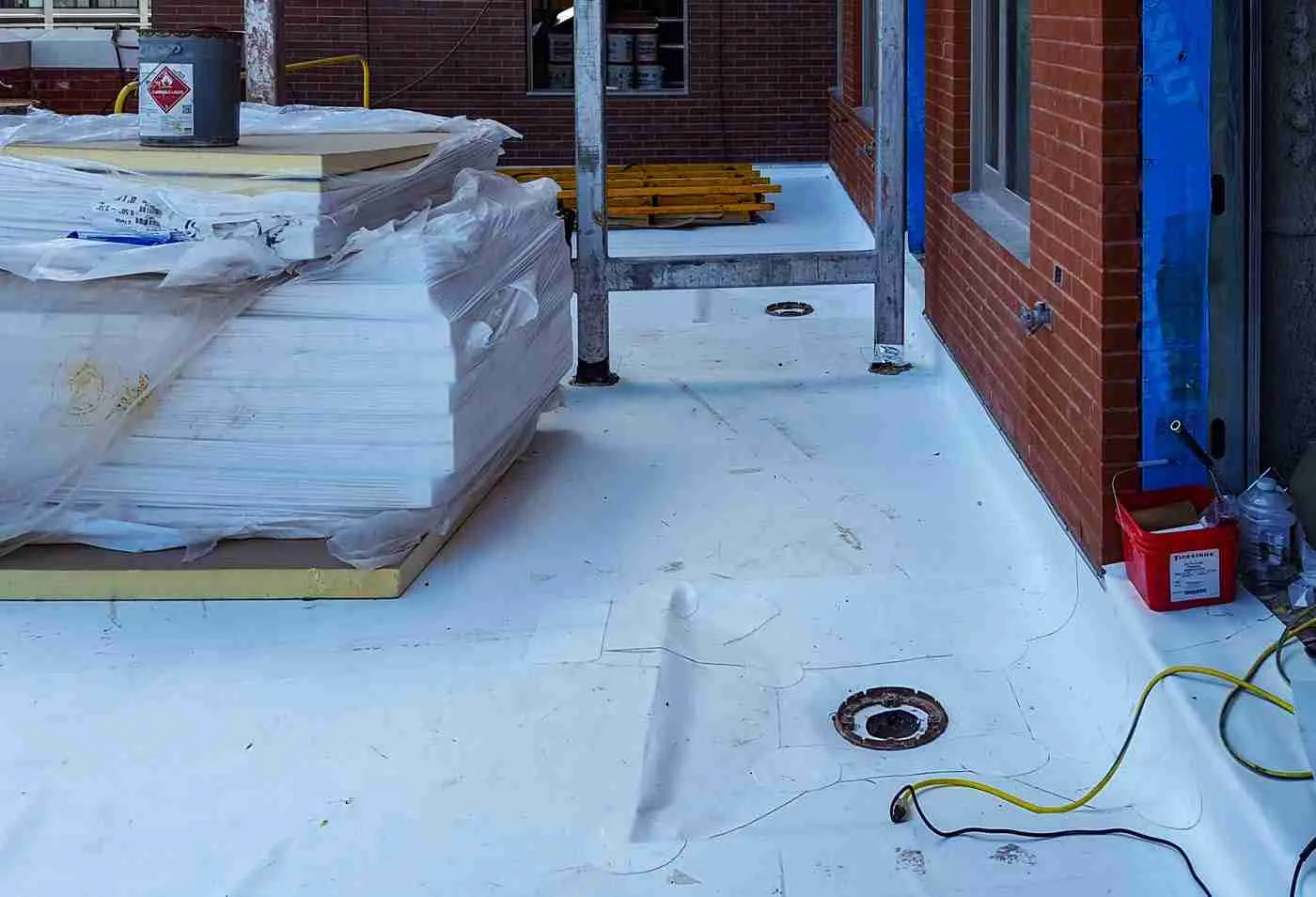 Roofing Supplies on pallet TPO roof by WAZE Development
