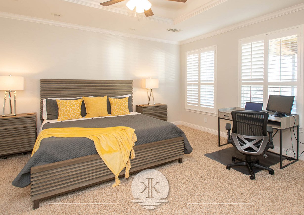 Spacious Primary bedroom with desk and office chair in case you need to work remotely.