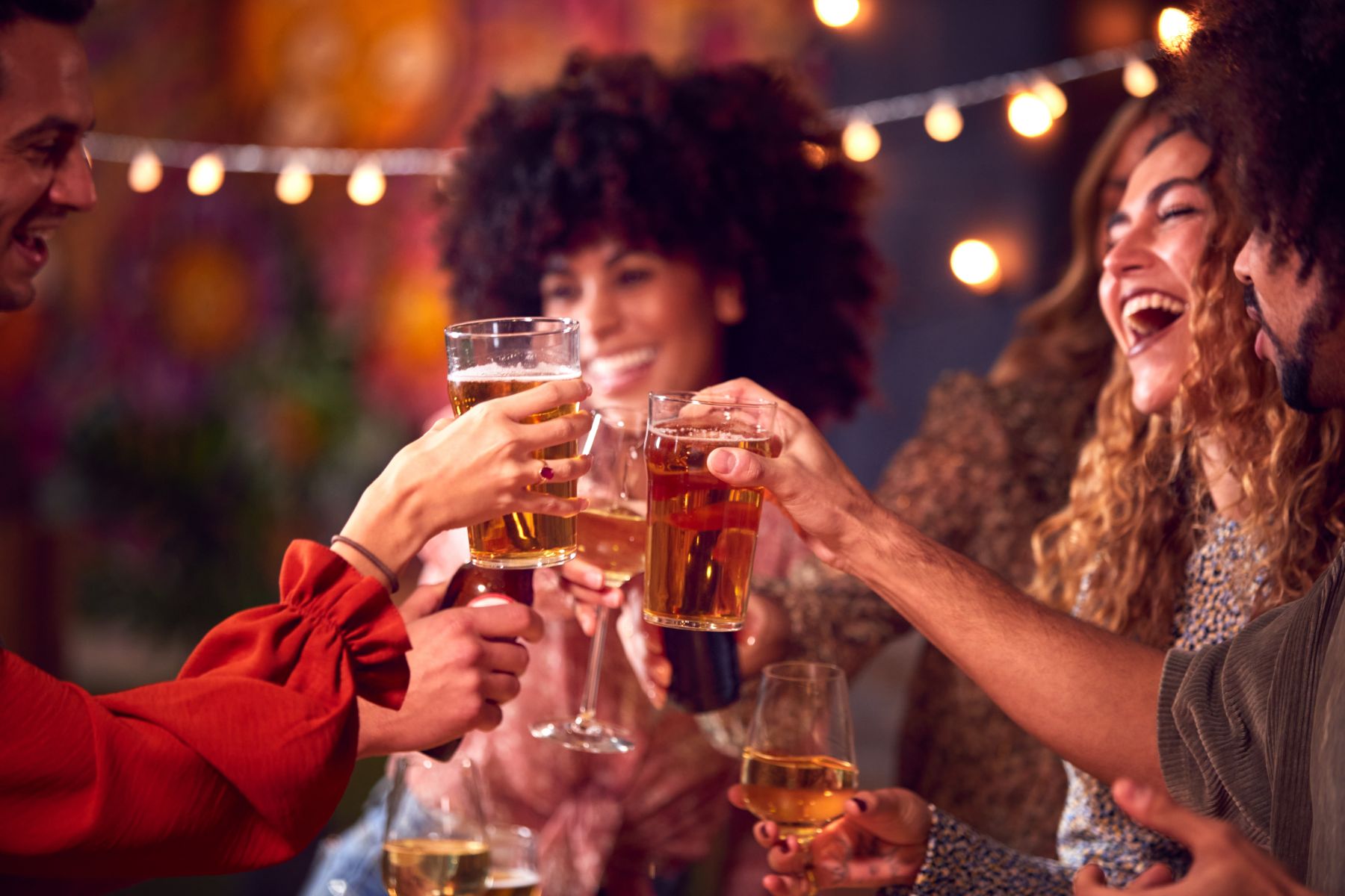 friends cheers with beer