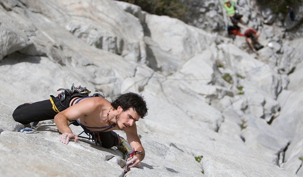 man rock climbing in yosemite