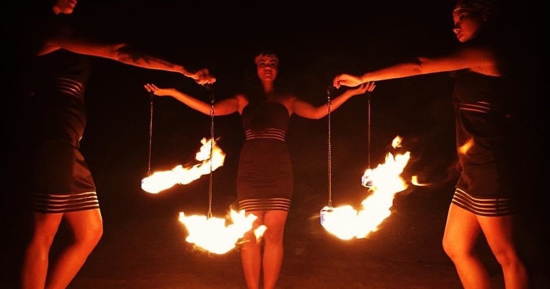 Fire dancers performing at the Polynesian Fire Luau