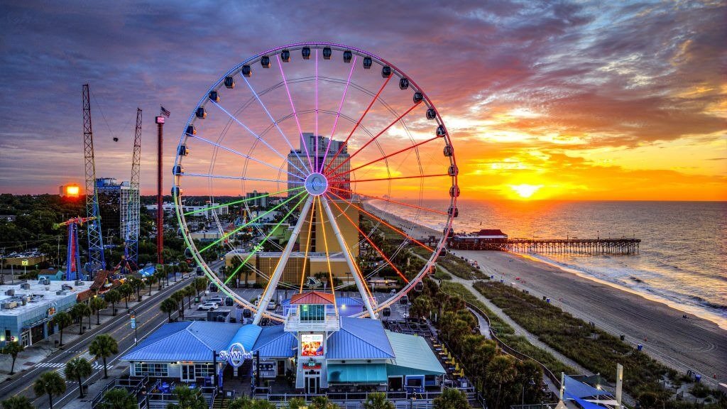 SkyWheel Myrtle Beach lit up at sunset
