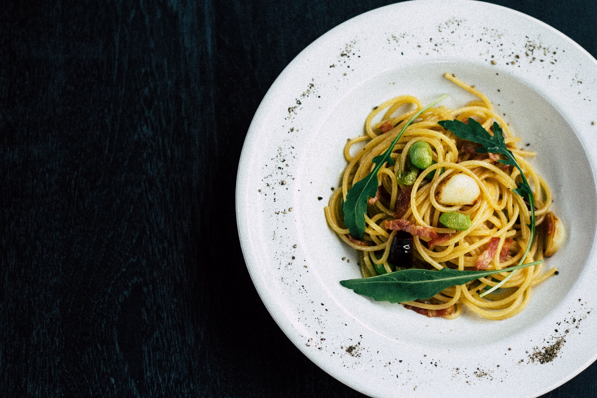 pasta with bacon and leaves