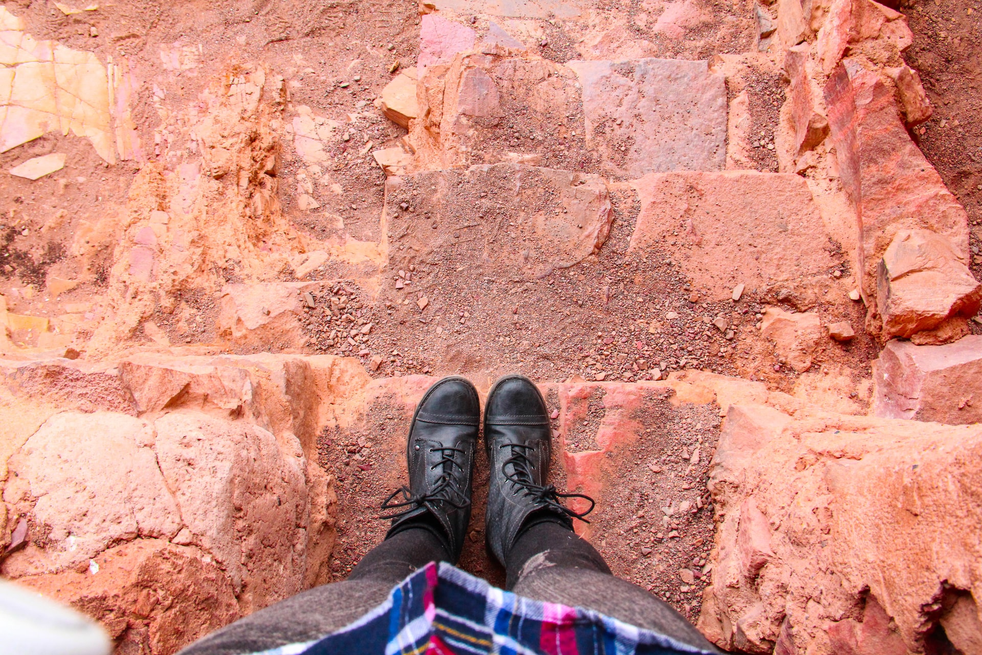 black boots on a hiking trail