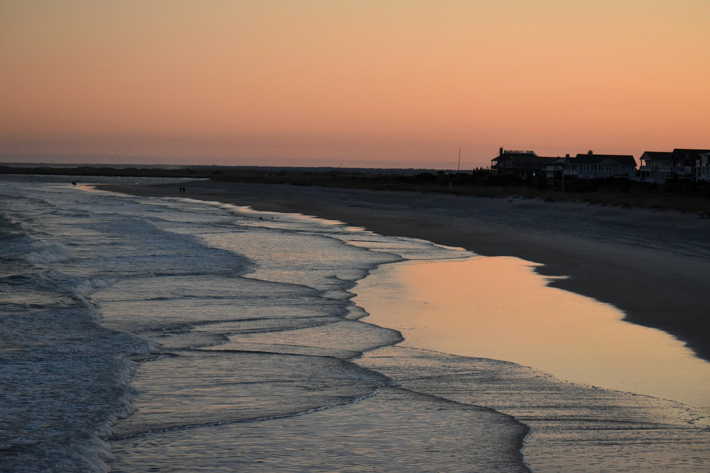 Winter afternoon on the beach at Atlantic Beach, North Carolina, empty sand and low December sun over the Atlantic
