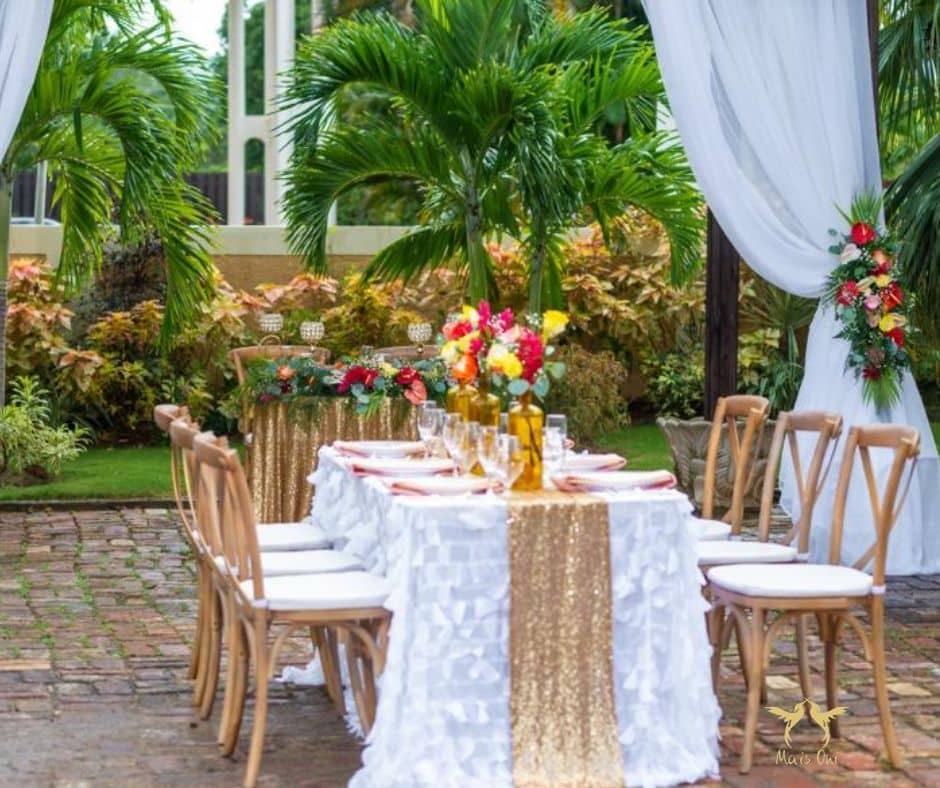 wedding reception table set up in a garden when you book your wedding through Airbnb - perfect for a small wedding