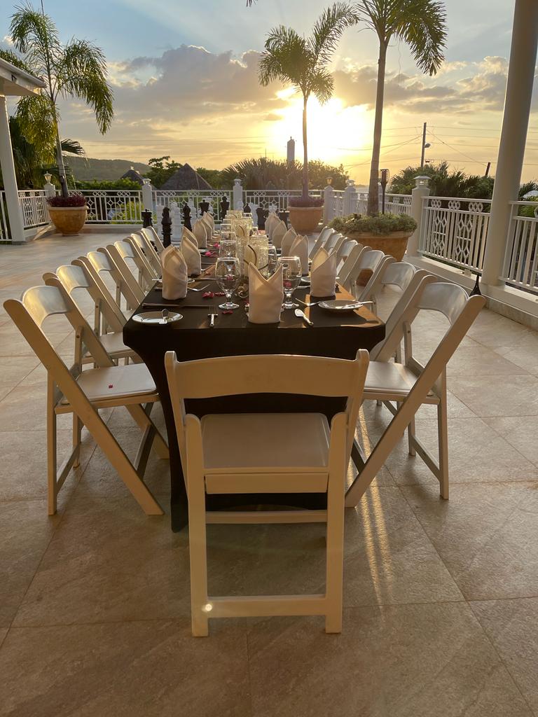 dining on the roof deck at Mais oui Villa in discovery Bay Jamaica