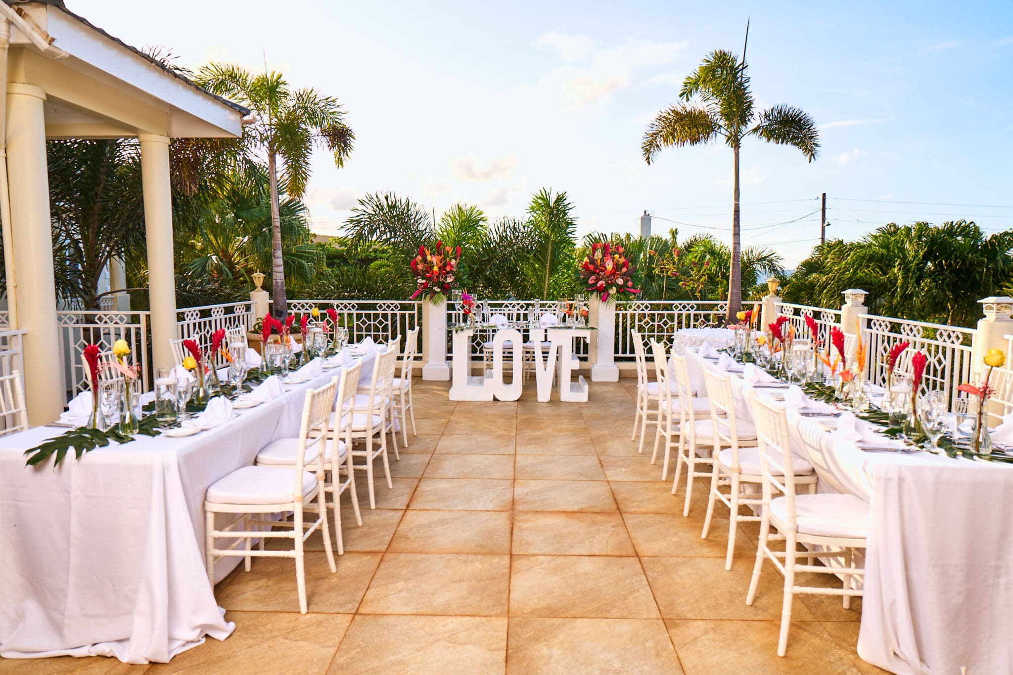 rooft top wedding reception at Jamaica villa wedding venue Mais Oui Villa in Discovery Bay