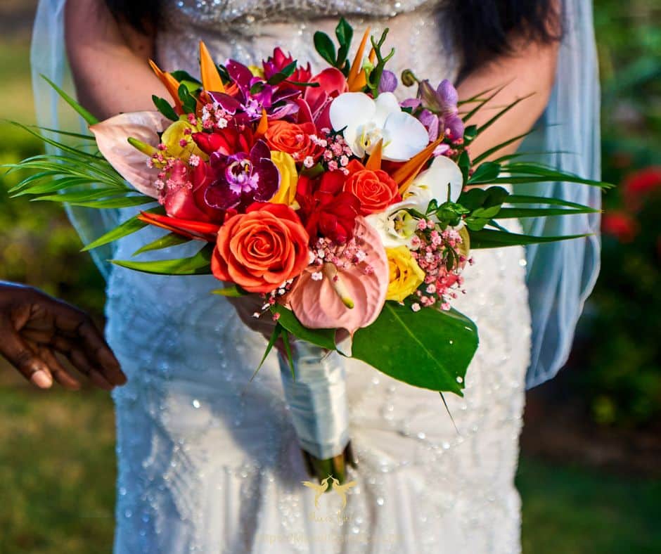 bride with tropical floral bridal bouquet at villa vs resort wedding in Jamaica