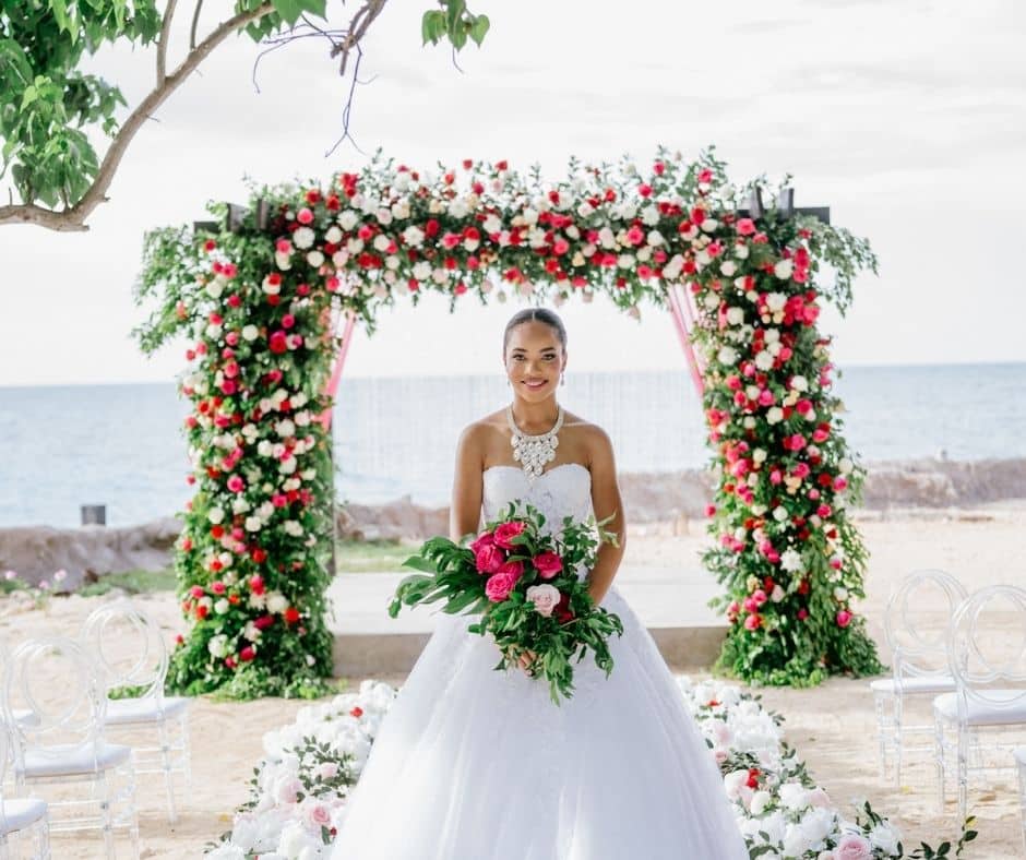 Bride at Borghinvilla wedding venue walking distance from Mais Oui Villa in Discovery Bay Jamaica for a a Jamaica villa wedding with a large guest list